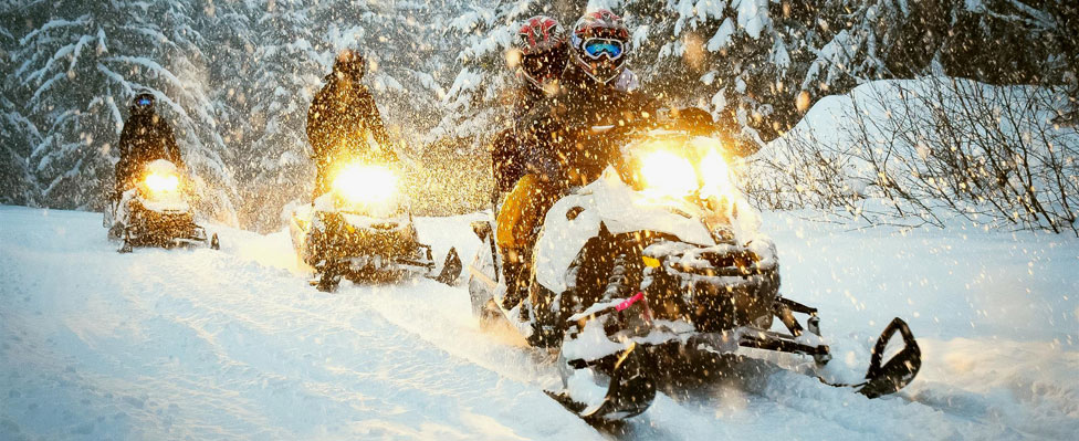 Explore the Heart of Quebec on a Snowmobile Trip!