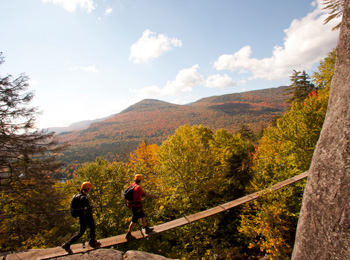 Two people on a via ferrata at the parc national du Mont-Tremblant.