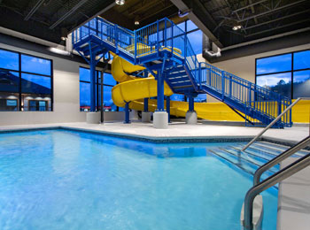 Indoor pool with waterslide at Microtel.