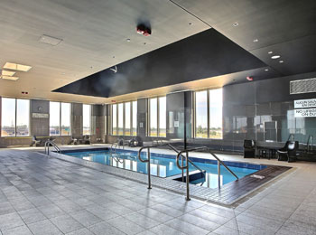 Indoor pool in a well-lit room.