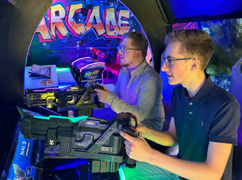 Arcade games with colourful lighting effects.