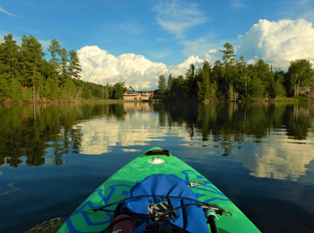 Paddleboard on the lake and view of the hotel.