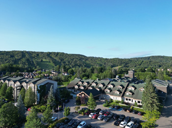 Manoir Saint-Sauveur and the mountain in the background.