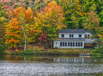 Lakeside house in the fall.