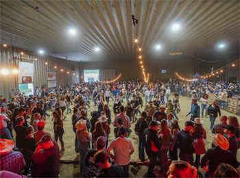 Country dancers in a barn at the Ayer's Cliff Rodeo.