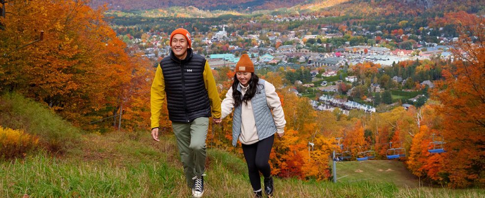 Couple hiking on a mountain.