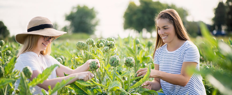 2 women in a field