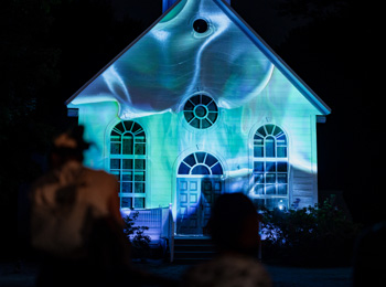 Church at night at the Village Québécois d'Antan.